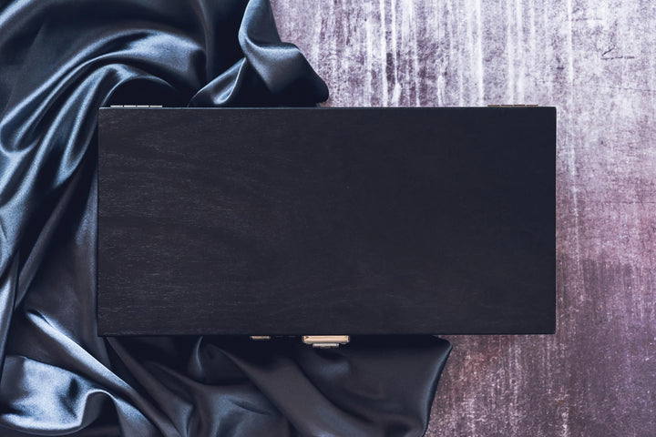 Black wooden box with combination lock