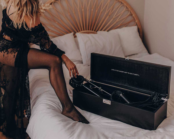 Black wooden box for adult toys