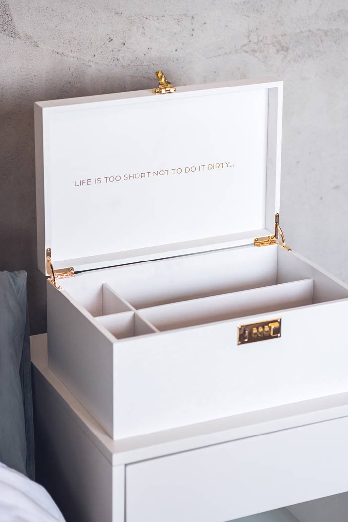 White wooden sex toy storage box with lock